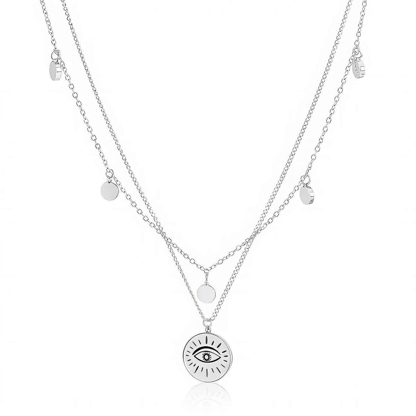 Silver layered necklace with eye pendant on a white background