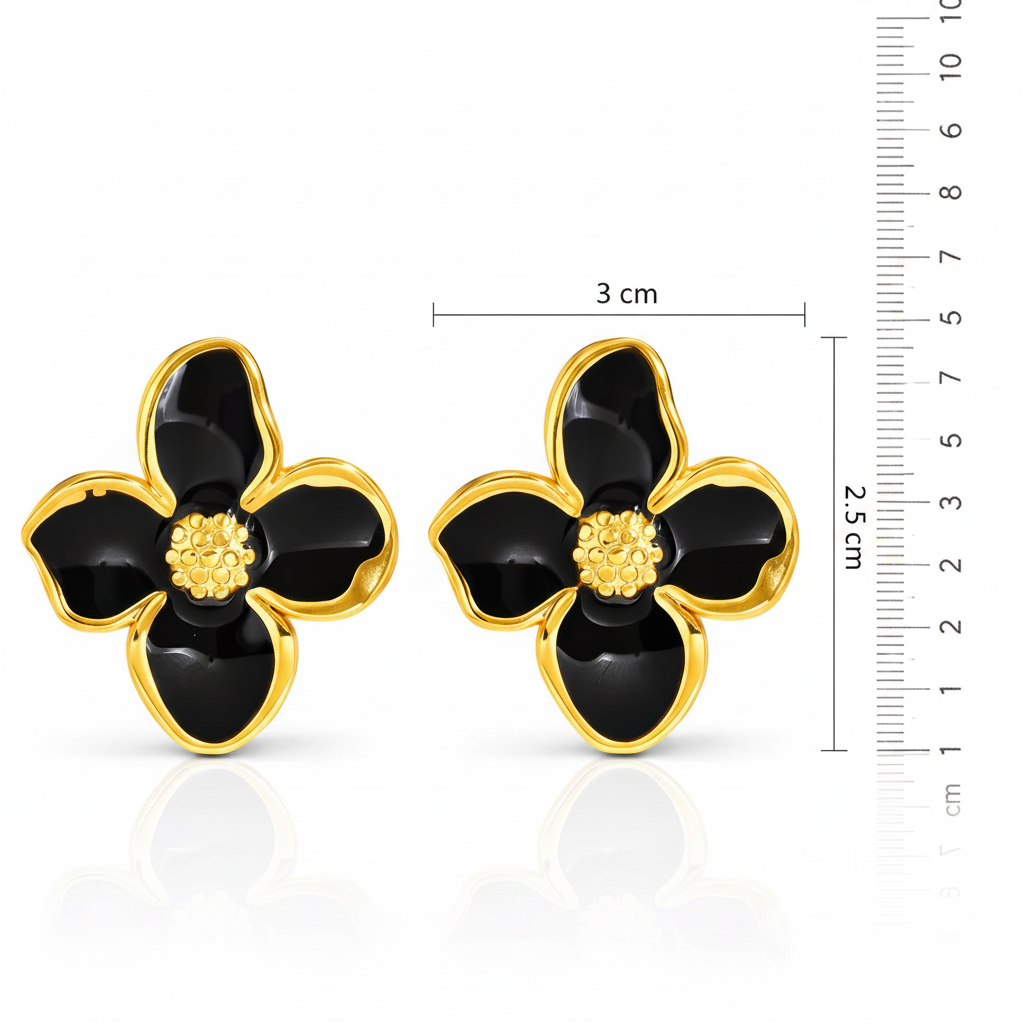 Black flower-shaped earrings with gold accents, shown with a measurement scale on a white background.