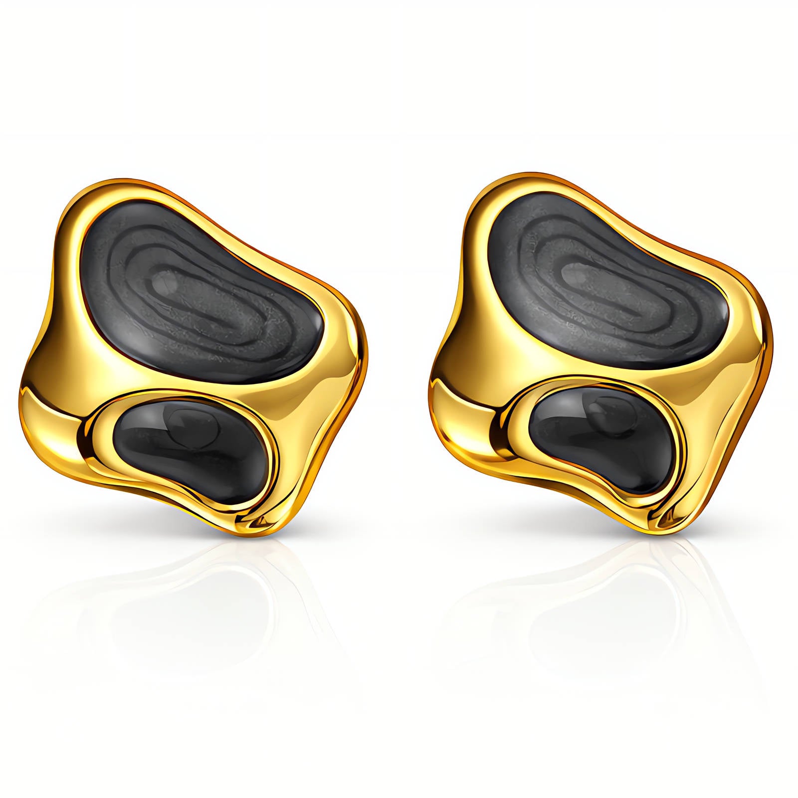 Gold earrings with black stones on a white background