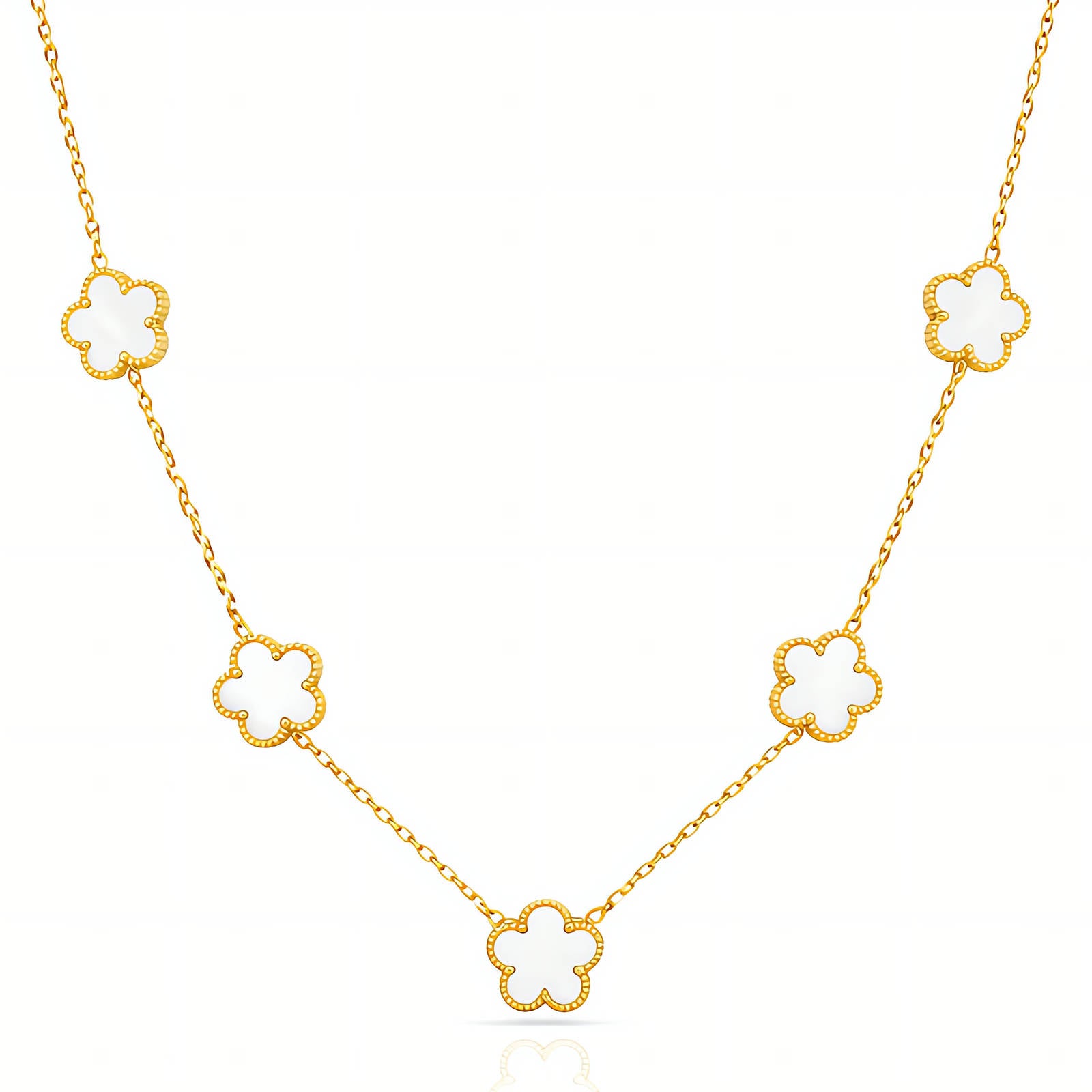 Gold necklace with clover-shaped pendants on a white background