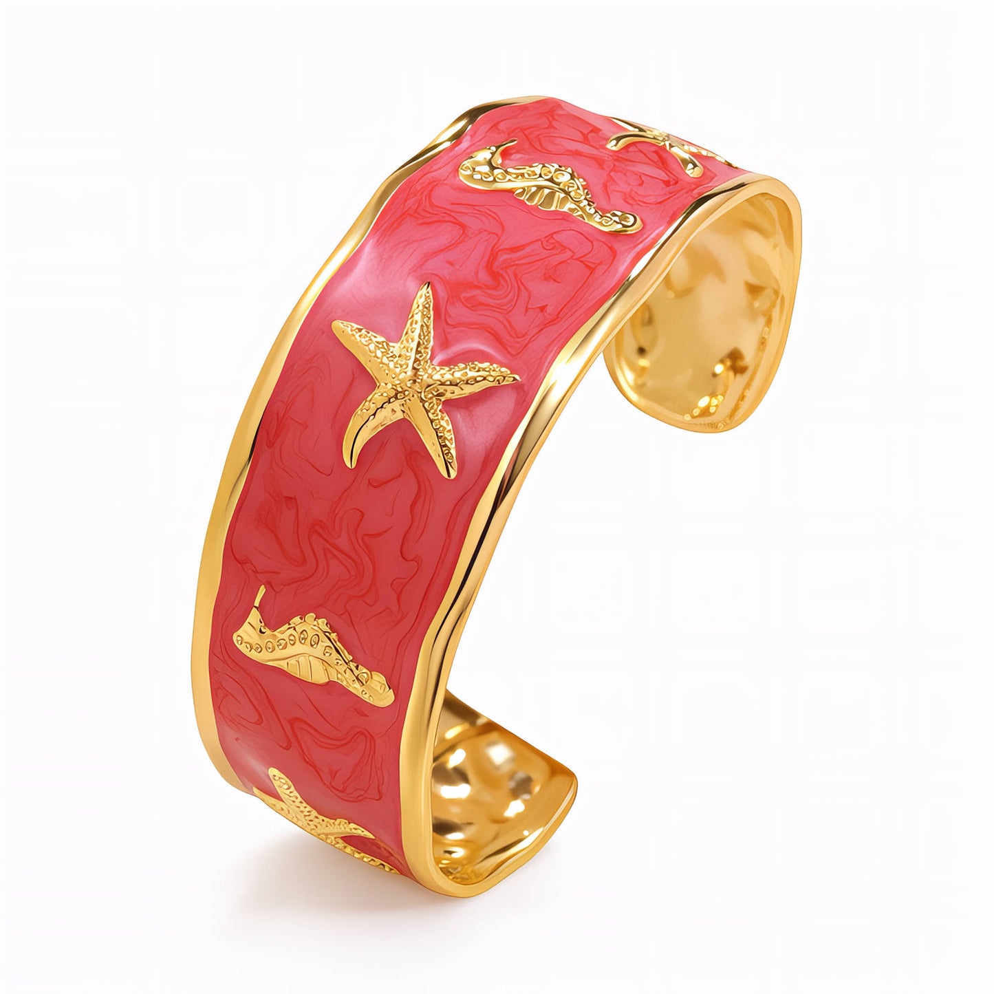 Pink cuff bracelet with gold accents on a white background