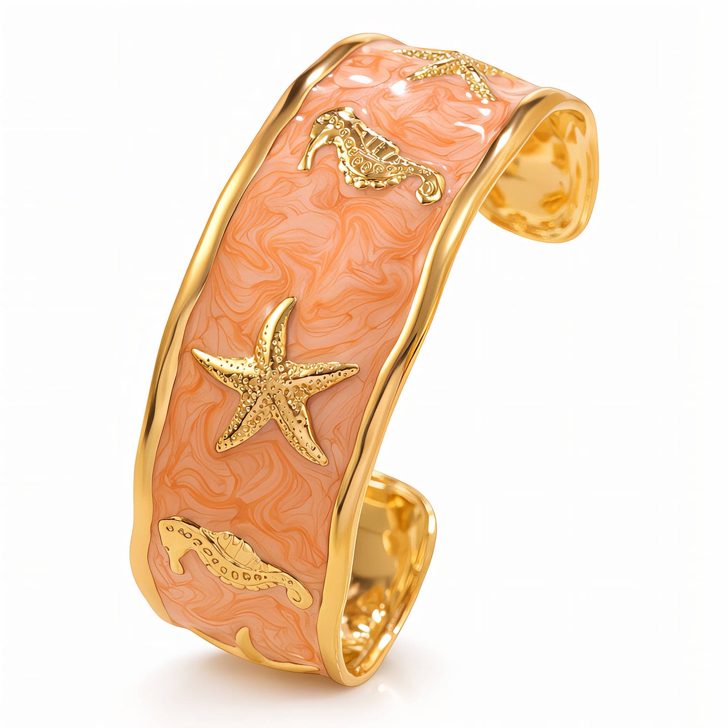 Gold bracelet with coral-colored design featuring starfish and fish on a white background