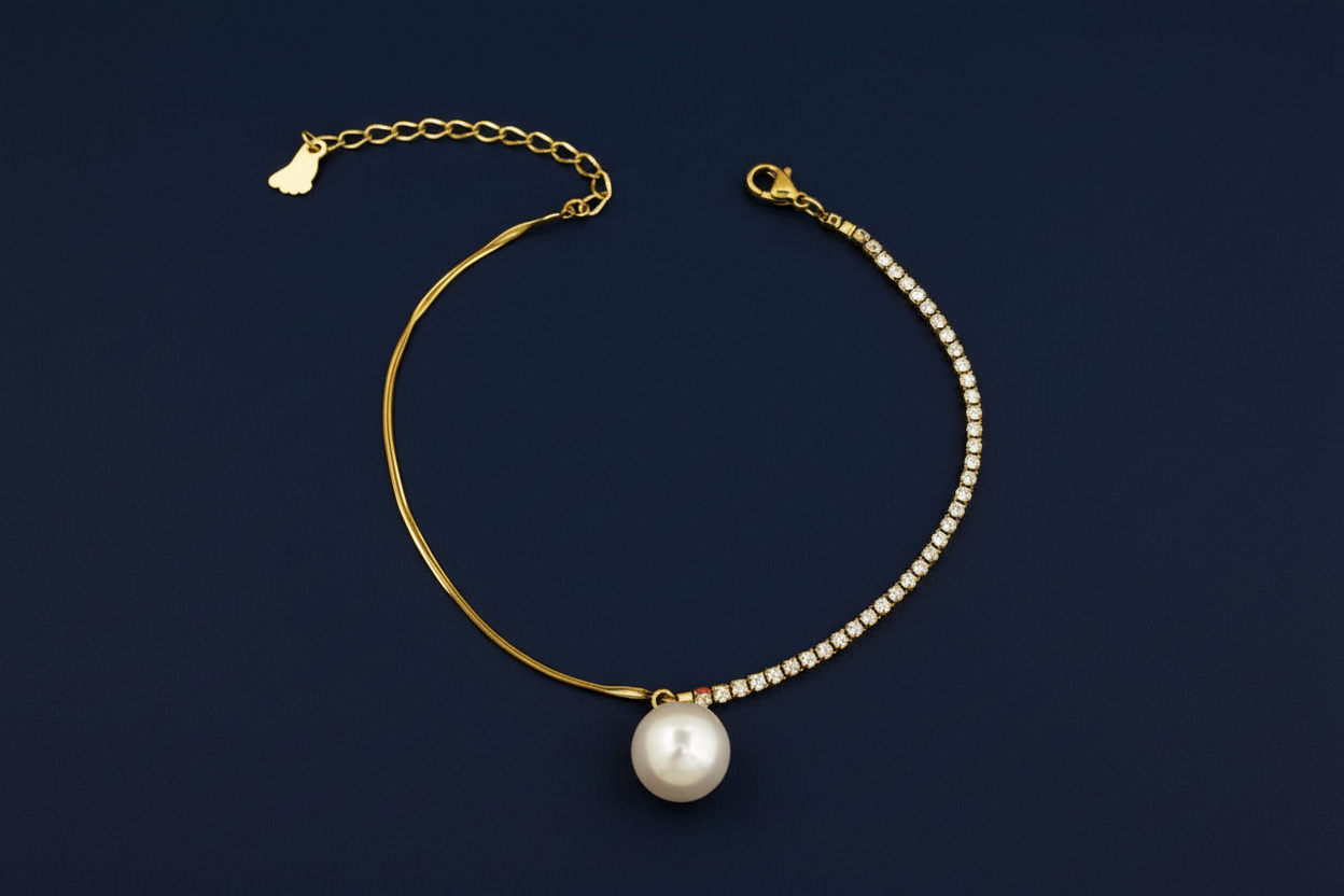 anti tarnish Gold anklet with a pearl pendant on a dark background