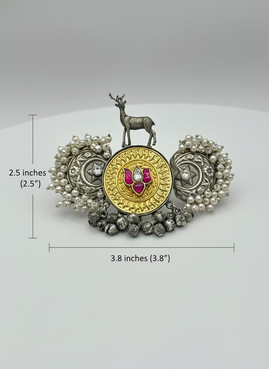 Decorative brooch with deer figure and measurements on a white background