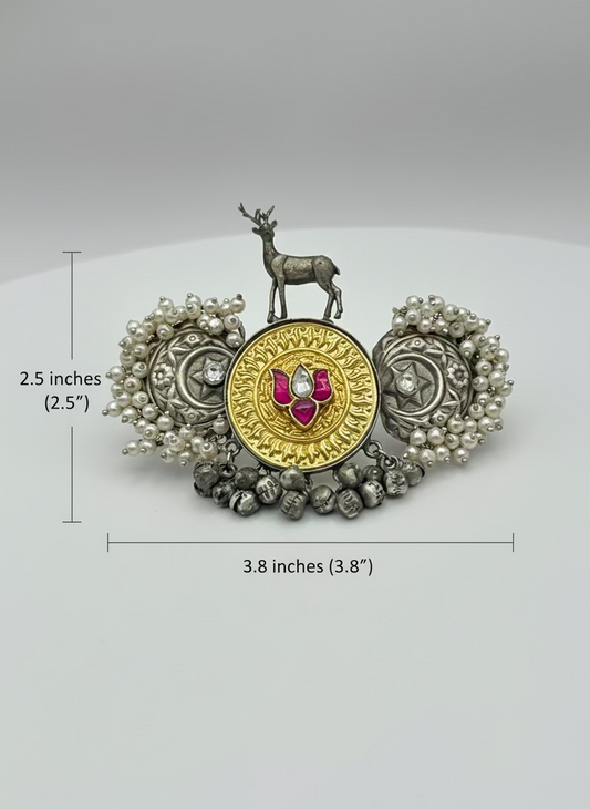 Decorative brooch with deer figure and measurements on a white background