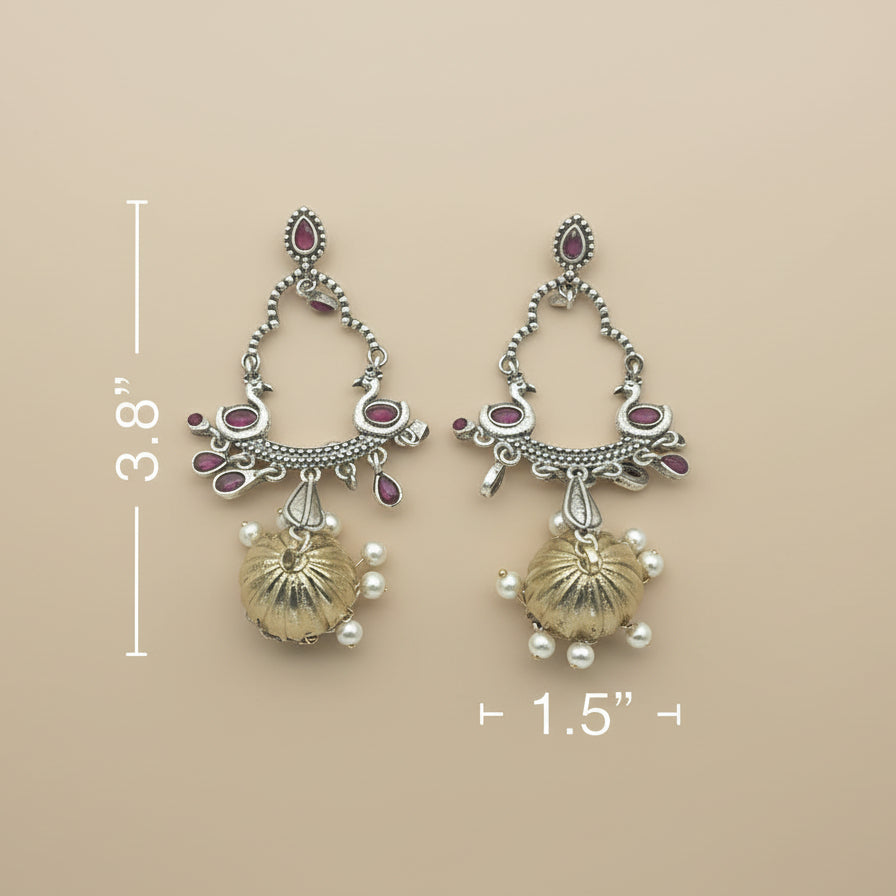 Pair of silver earrings with gemstones and shell-like designs, shown with measurements on a white background.