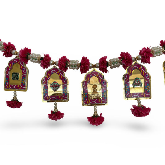 Decorative garland with floral elements and ornate hanging pieces on a white background