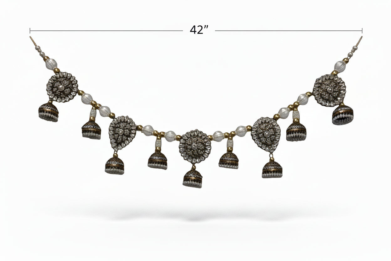 Decorative toran with bells and crystals, 42 inches long, on a white background.